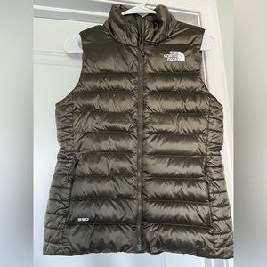 The North Face green shiny puffer vest. Super warm.